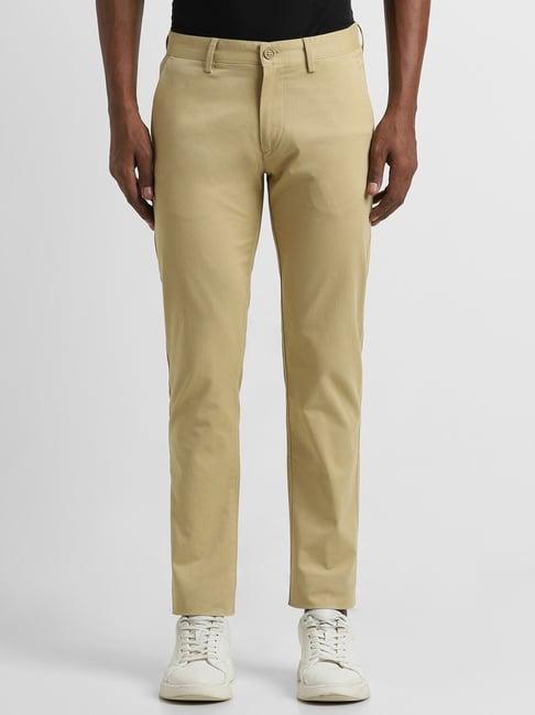 peter england beige cotton slim fit trousers