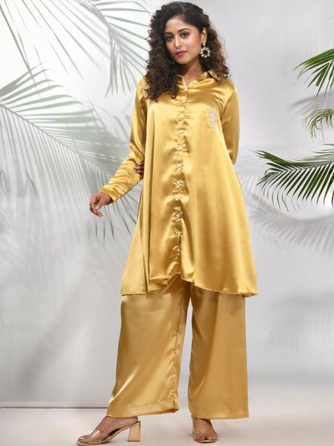 charukriti yellow embellished kurti palazzo set