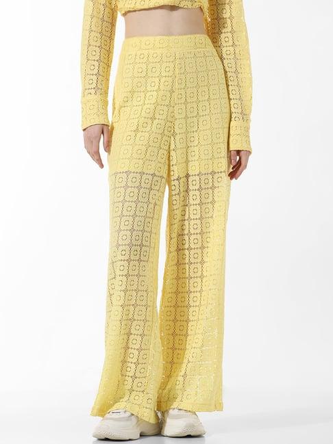 only yellow cotton self design flared fit high rise pants