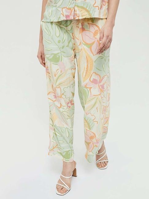 ginger by lifestyle green & beige printed flared pants