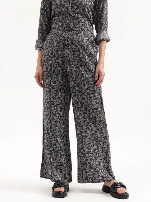 united colors of benetton black & white modal floral print regular fit mid rise trousers