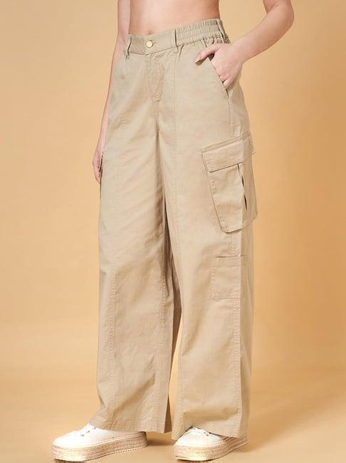 yu by pantaloons beige mid rise flared pants