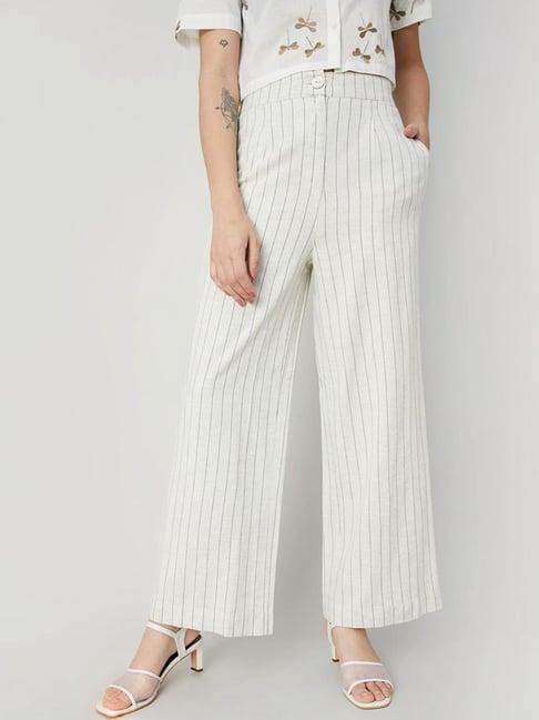 code by lifestyle off-white striped flared pants