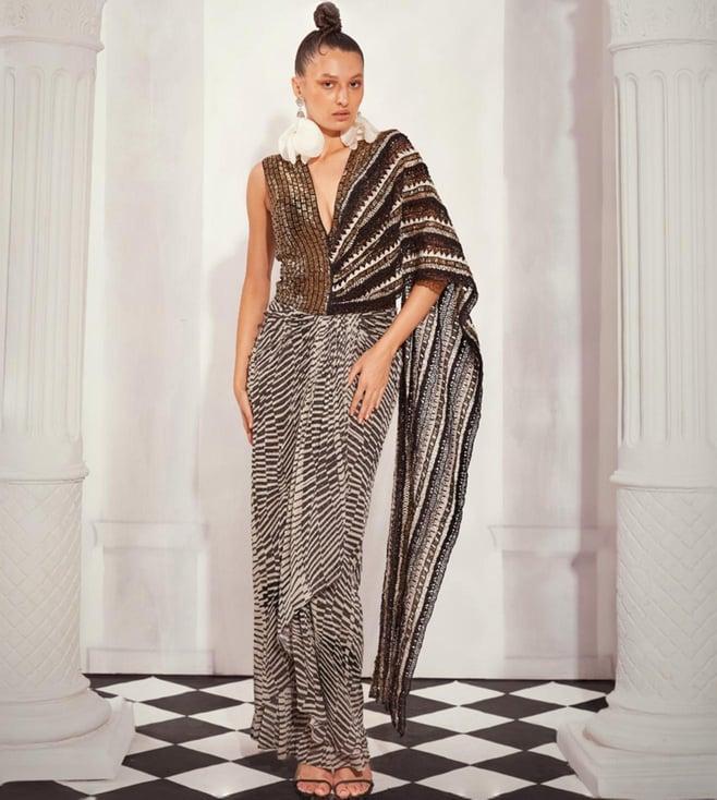 nikita mhaisalkar black & white heavy embellished draped saree