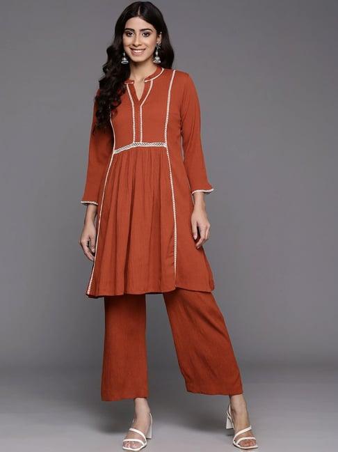 varanga rust self pattern kurti pant set