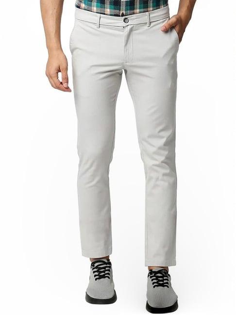 basics beige tapered fit texture trousers