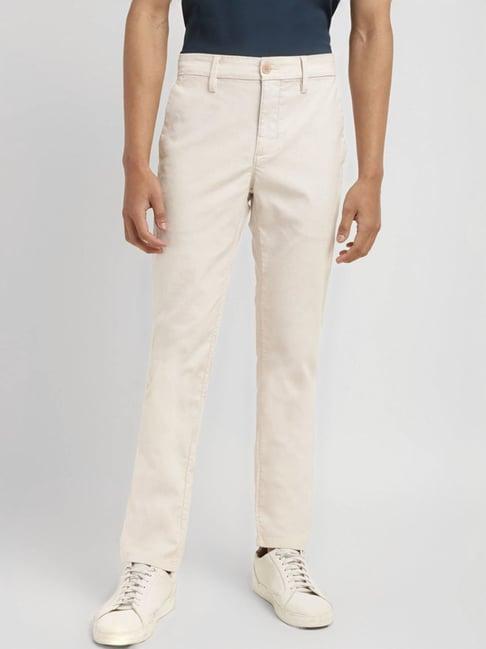 levi's cream slim fit trousers