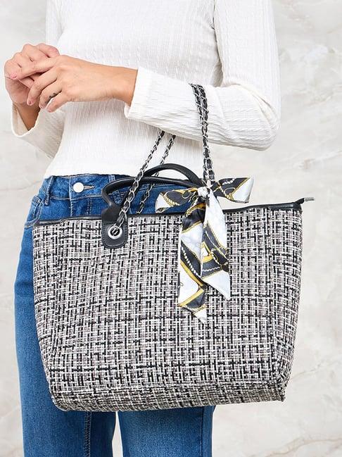 styli black & white textured handbag