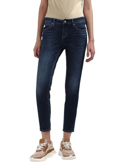 calvin klein dark stone blue mid rise jeans