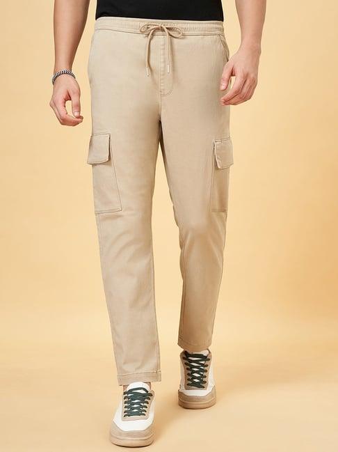 urban ranger by pantaloons irish cream cotton slim fit cargos