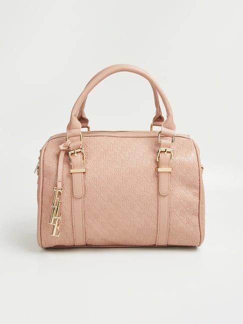 elle pink textured handbag