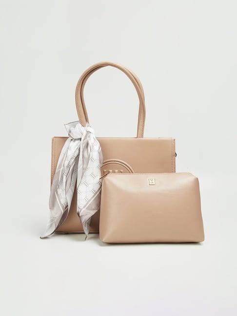 elle beige solid handbag with pouch