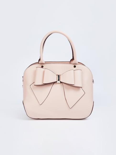 ginger by lifestyle pink textured handbag