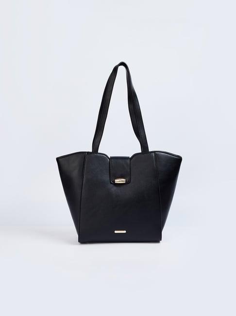 ginger by lifestyle black solid shoulder handbag