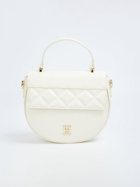 elle white textured sling handbag