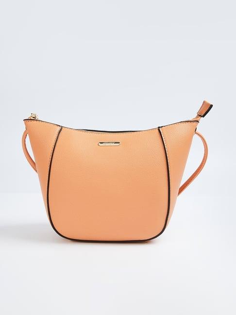 ginger by lifestyle orange solid sling handbag