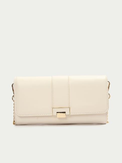 ginger by lifestyle off white solid sling handbag