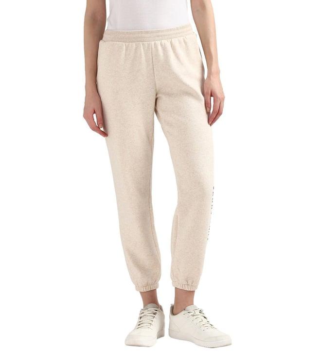 tommy hilfiger women beige solid regular fit mid-rise trackpants