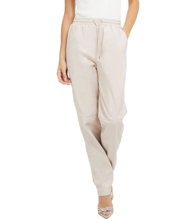 guess women's beige polyurethane solid regular fit joggers