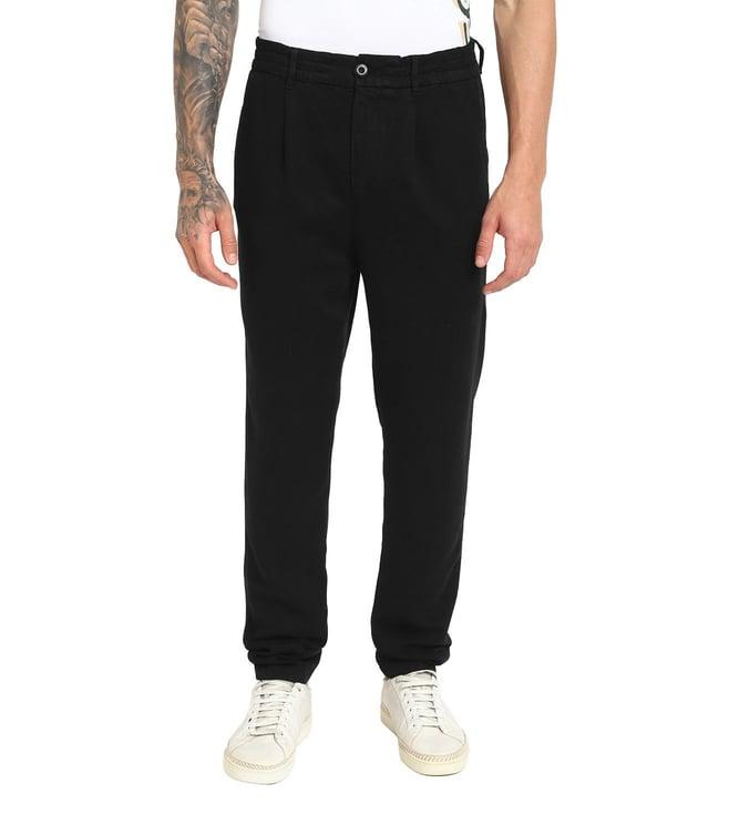 guess men's black lyocell solid slim fit trousers