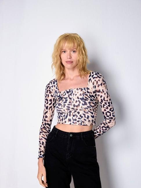 cover story beige & black animal print crop top