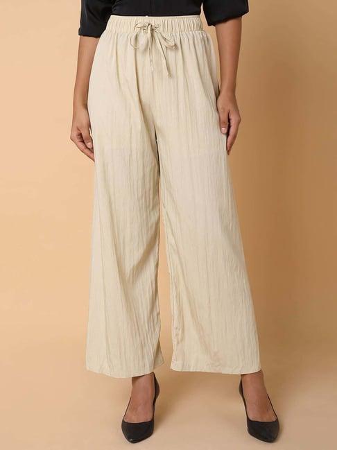 showoff cream pleated flared pants