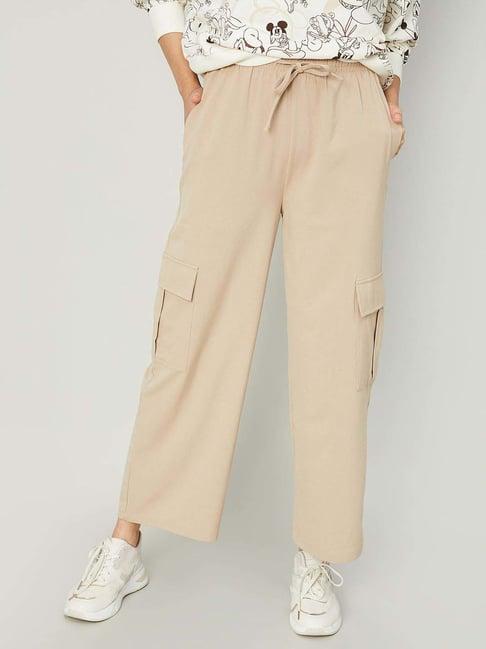 ginger by lifestyle beige cotton mid rise flared pants