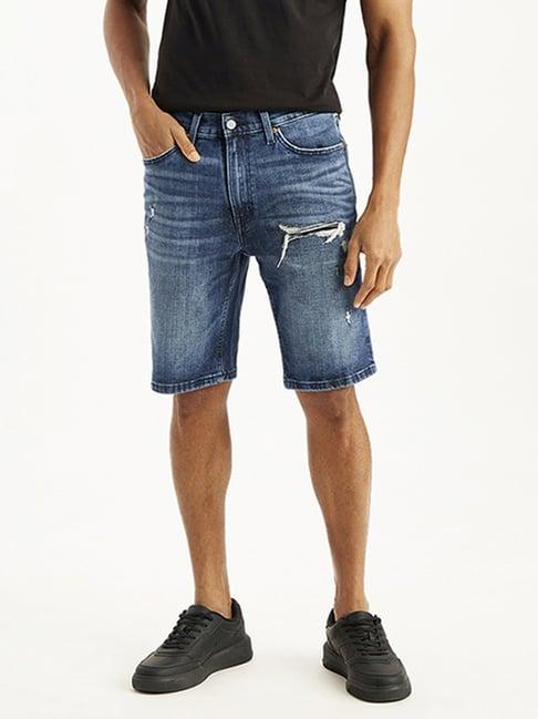 levi's blue tapered fit distressed denim shorts