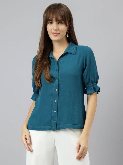 latin quarters teal shirt