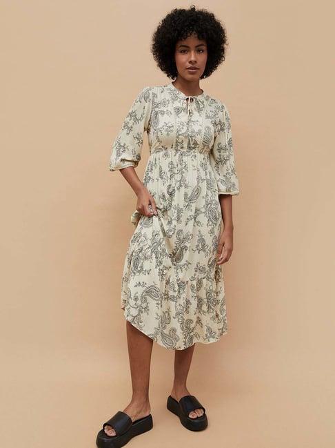 fame forever by lifestyle beige printed a-line dress