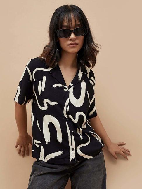 ginger by lifestyle black printed top