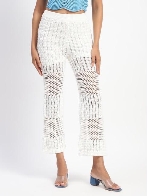 madame off white cotton self design mid rise trousers