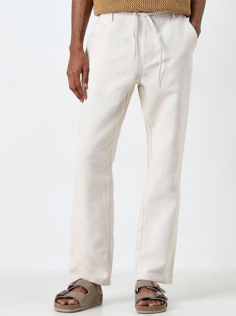 eta by westside off-white relaxed-fit mid-rise cotton chinos