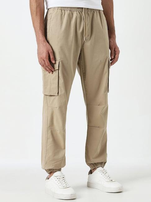 wes casuals by westside beige relaxed-fit mid-rise cotton blend pants