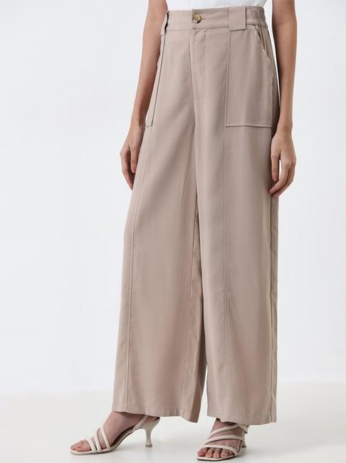 lov by westside beige flared high-rise trousers