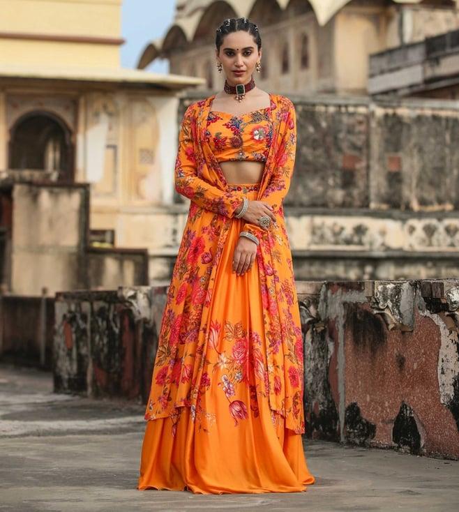 scakhi orange chinon silk floral print & embellished lehenga with choli and cape