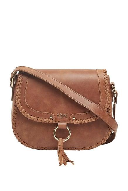 tohl tan distressed leather flap sling bag