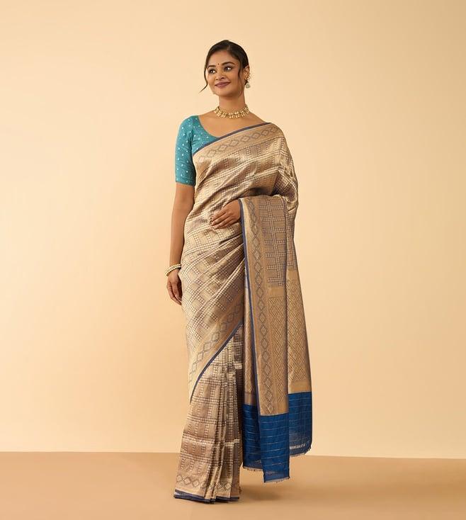 taneira blue tissue silk woven design saree