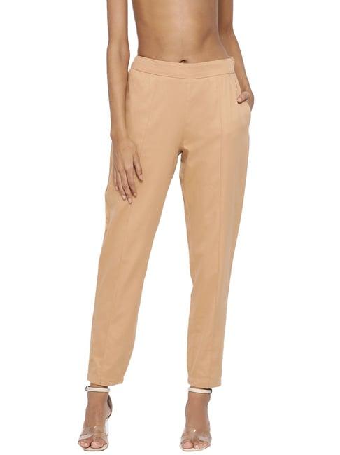 rooted beige cotton trousers