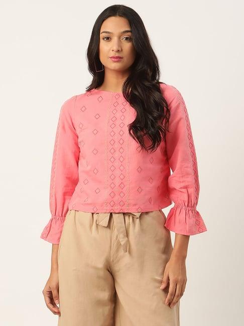 rooted pink embroidered top