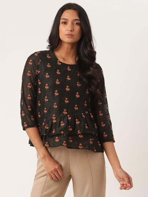 rooted black embroidered top