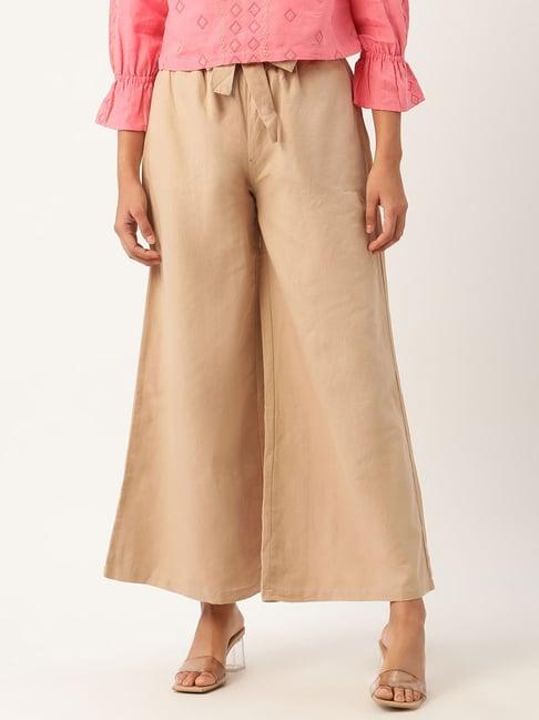 rooted beige mid rise trousers