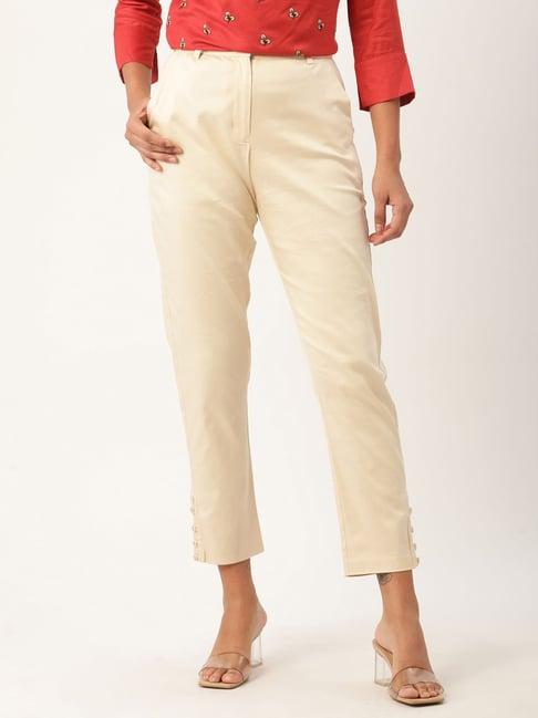 rooted white mid rise trousers