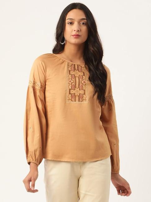 rooted beige embroidered top