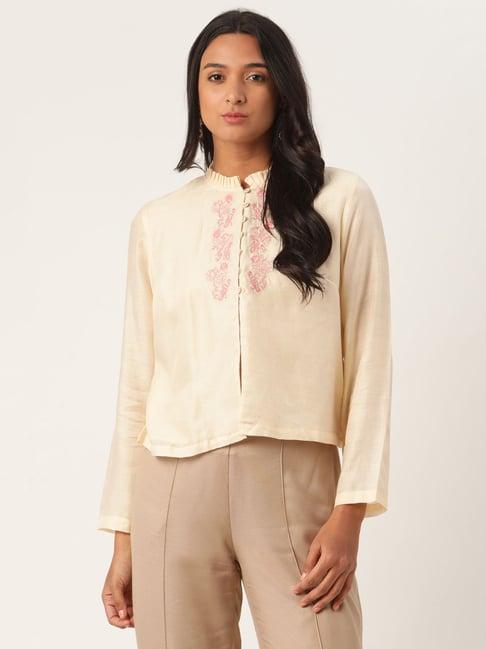 rooted ecru embroidered top