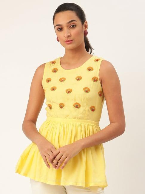 rooted yellow embroidered top