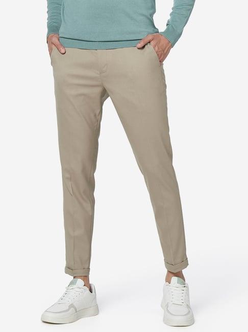 wes formals by westside light khaki carrot fit trousers