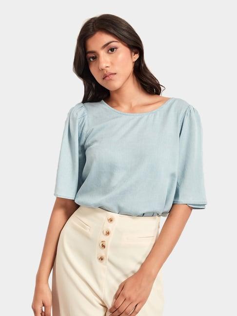 cover story blue round neck top