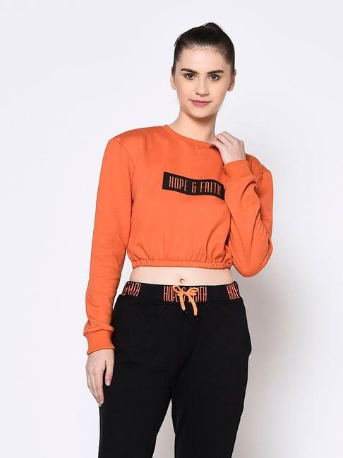 rigo orange graphic print crop sweatshirt