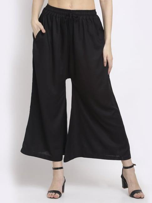 women black excess flared rayon palazzo with fully elasticated waistband, slip on closure, drawstrings at the side along with 2 pockets on the side.